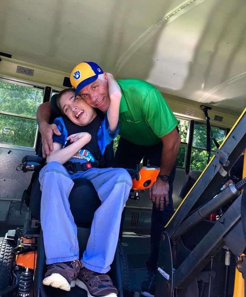 Dwight Miller with a special needs student in Wisconsin