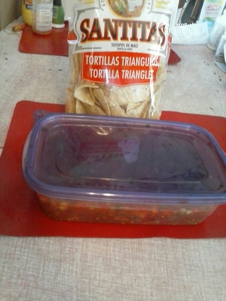 Photo is mine of salsa and chips from friends/neighbors