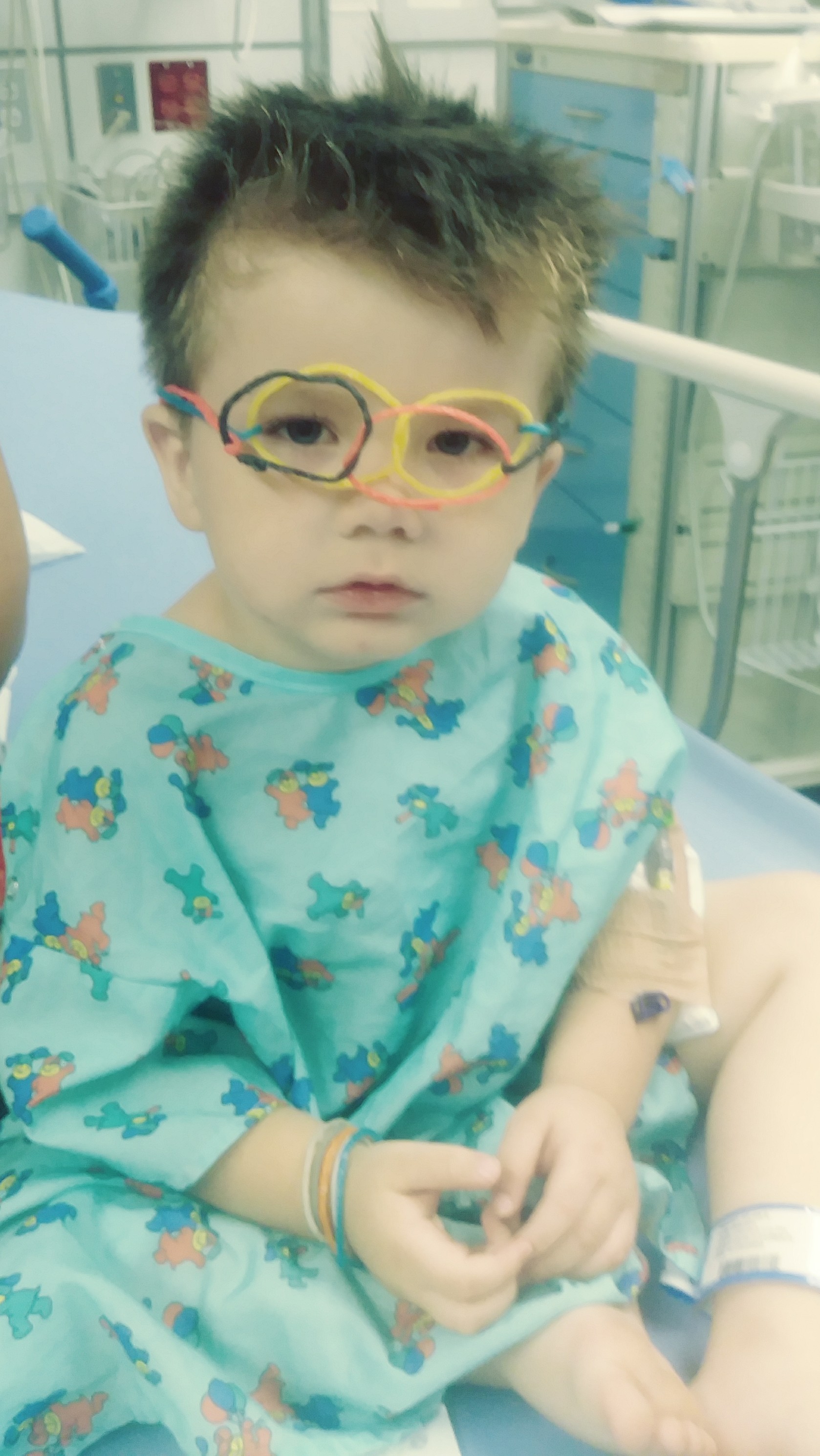 Julian in the er wearing silly glasses