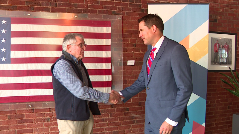 Congressman Seth Moulton gives Vietnam War veteran John Mulloy his medals Congressman Seth Moulton gives Vietnam War veteran John Mulloy his medals