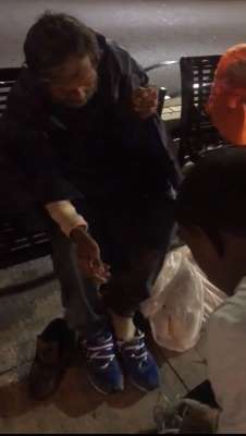 A homeless man in Knoxville gets a gift from a college football player. A homeless man in Knoxville gets a gift from a college football player.