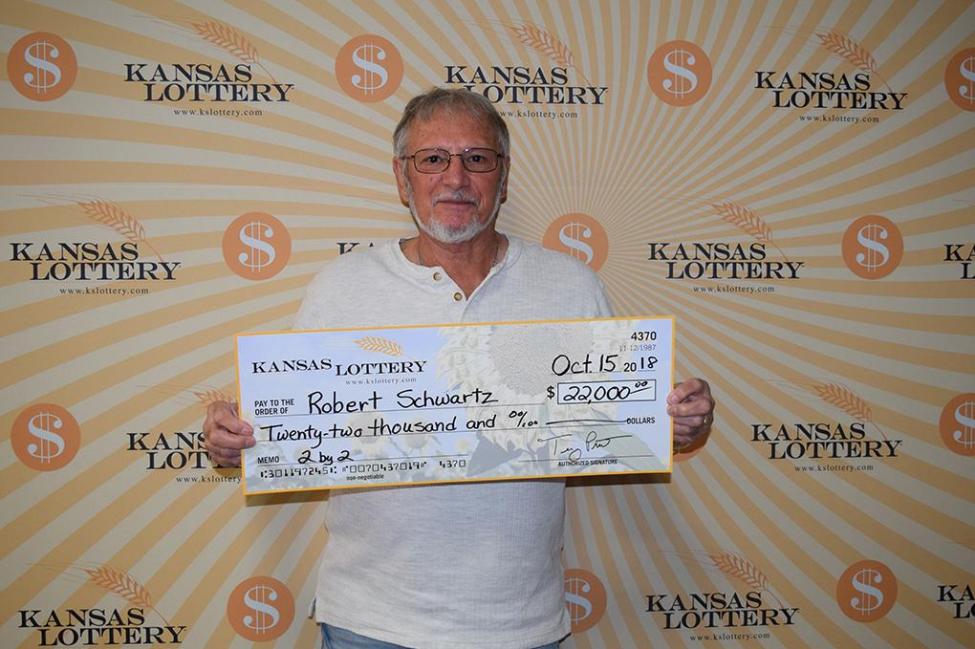 Robert Schwartz wins the grand prize in the Kansas Lottery