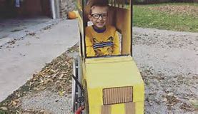 Blake Mompher riding his wheelchair that is inside a school bus Blake Mompher riding his wheelchair that is inside a school bus