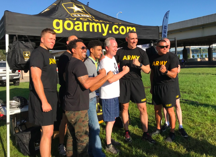 Louisville mayor Greg Fischer, surrounded by Army members at the Labor Day 2018 Hike, Bike, and Paddle event at Waterfront Park. Photo taken by and the property of FourWalls. Louisville mayor Greg Fischer, surrounded by Army members at the Labor Day 2018 Hike, Bike, and Paddle event at Waterfront Park. Photo taken by and the property of FourWalls.