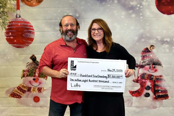 Tina and Harold Ehrenbergs with their winning lottery ticket