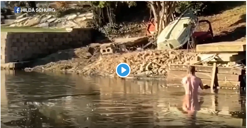 Darden Schurg (pictured) saves a cat who nearly drowned in a frozen lake Darden Schurg (pictured) saves a cat who nearly drowned in a frozen lake