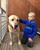 Roman McConn and a pet dog that is his best friend Roman McConn and a pet dog that is his best friend