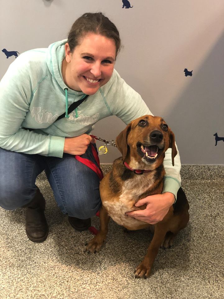 A happy owner with the dog she adopted named Cassie A happy owner with the dog she adopted named Cassie