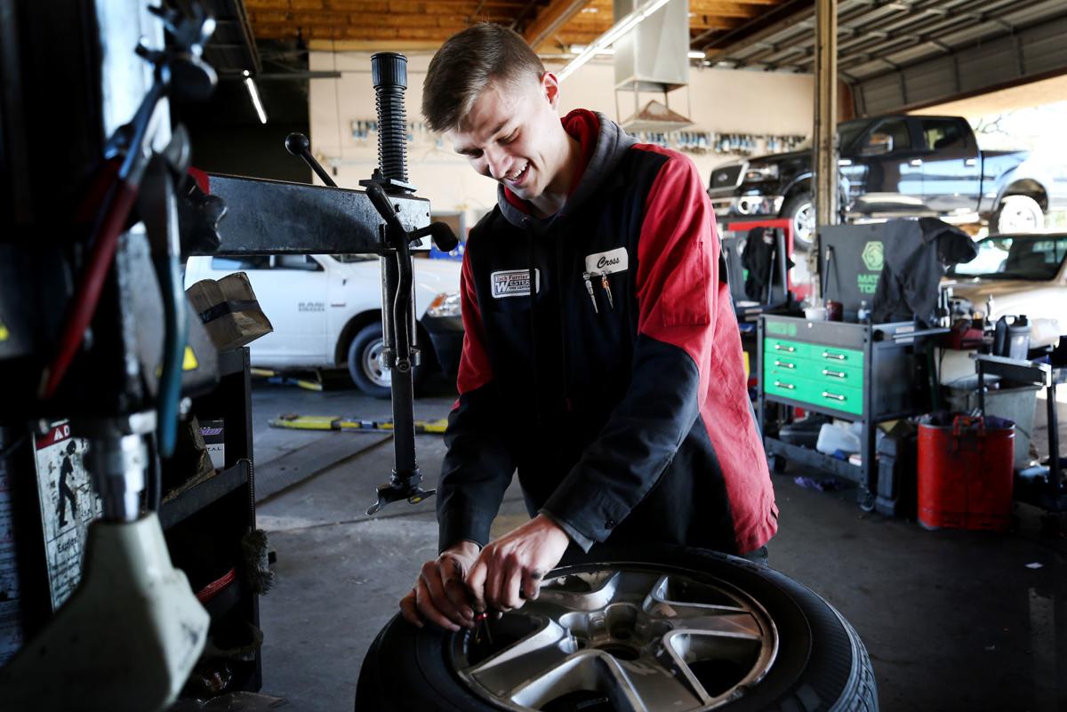 Auto mechanic Cross Scott at his workplace Auto mechanic Cross Scott at his workplace