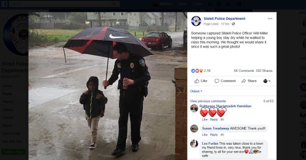 Slidell Police Officer Will Miller doing his duty with a student going to school