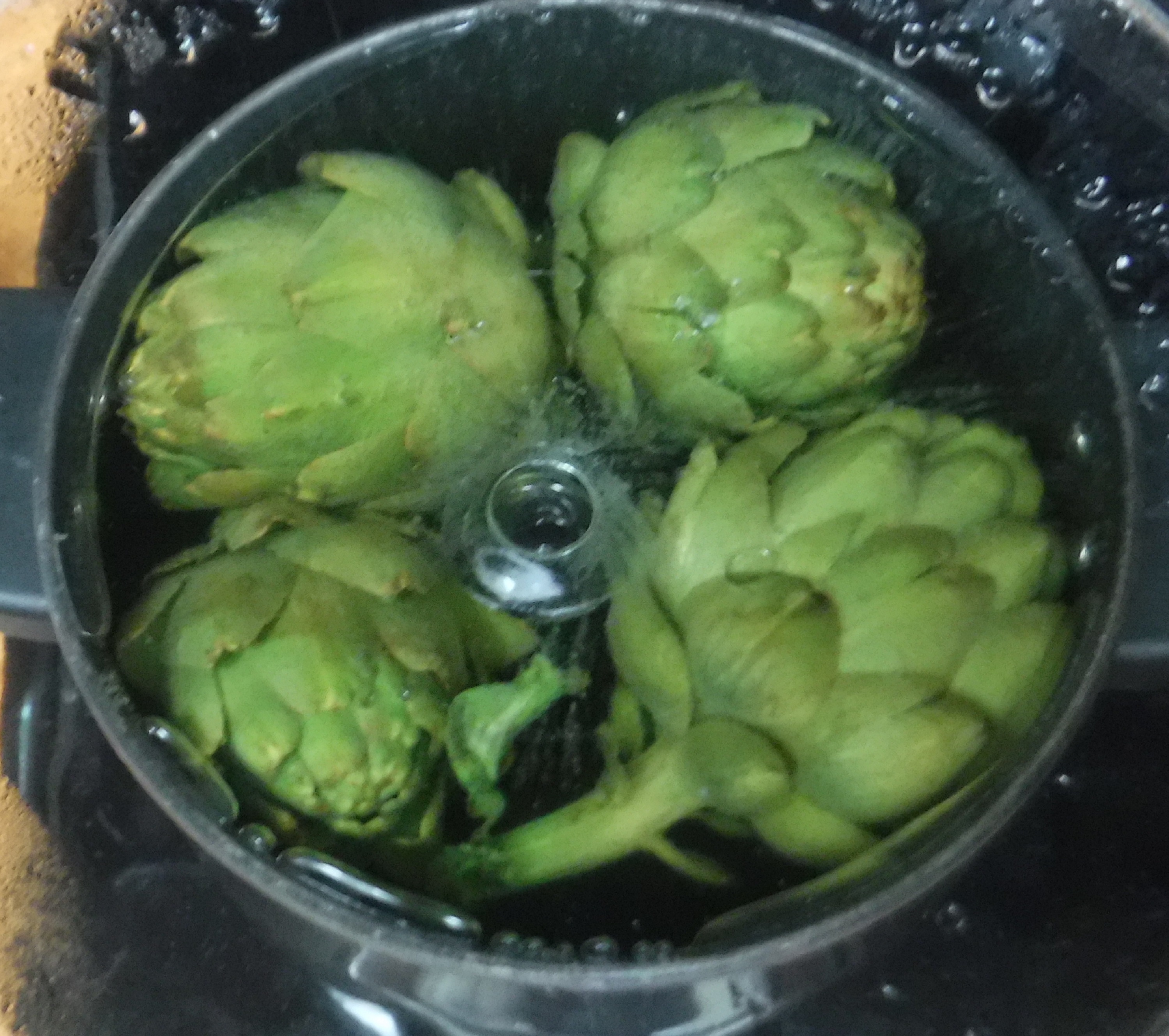 Photo I took of the artichokes cooking in their pot Photo I took of the artichokes cooking in their pot