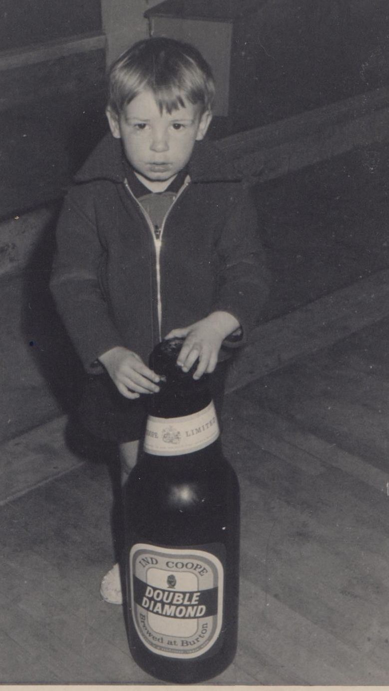 Photo taken by my dad in about 1968-9, me with a giant beer bottle. Photo taken by my dad in about 1968-9, me with a giant beer bottle.