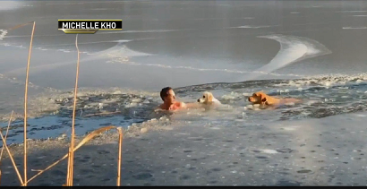 Timothy Yuriev and his dog Kira to the rescue of two dogs in New York