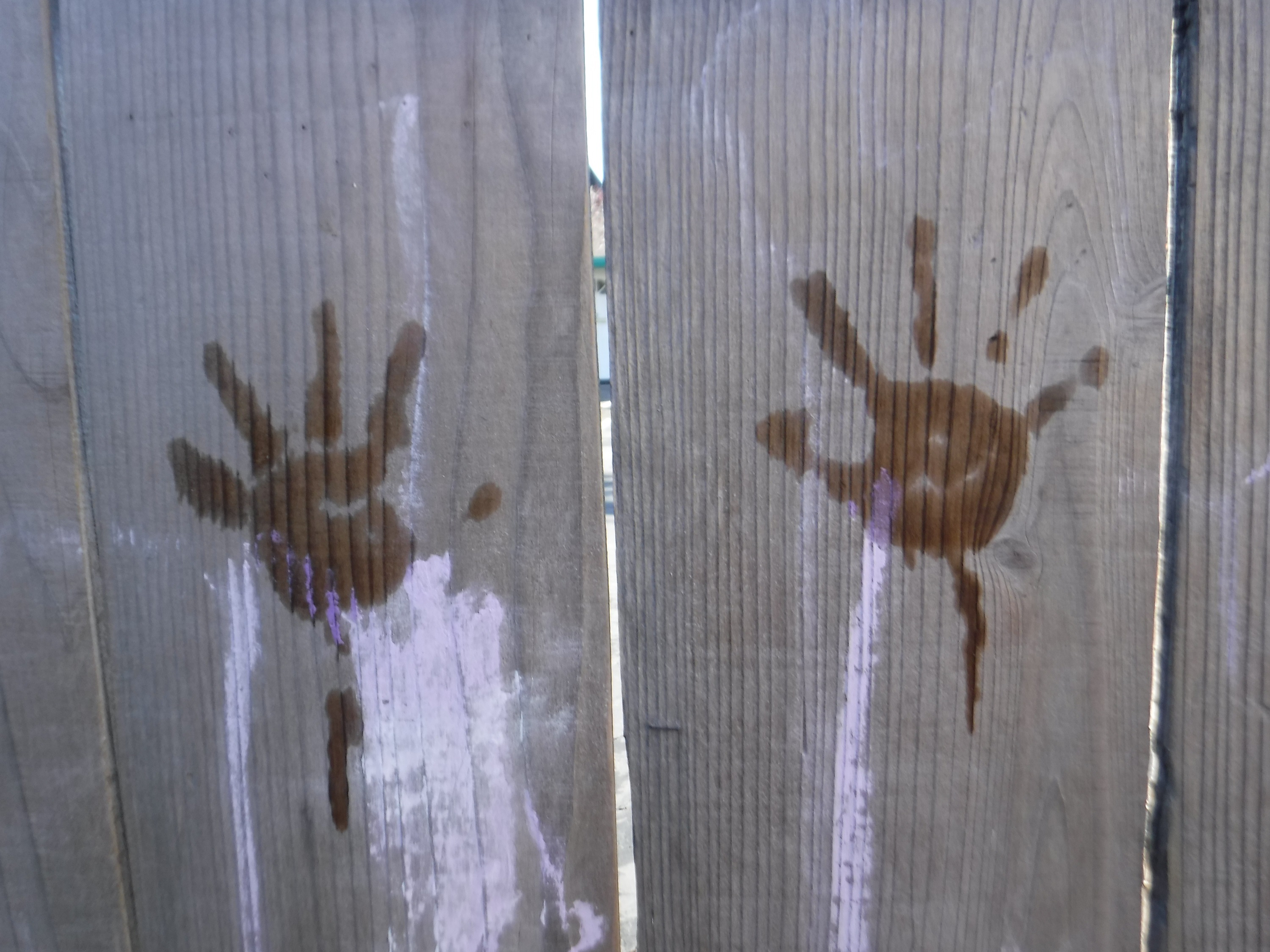 Photo taken by me of kids' hand prints on the fence at work Photo taken by me of kids' hand prints on the fence at work