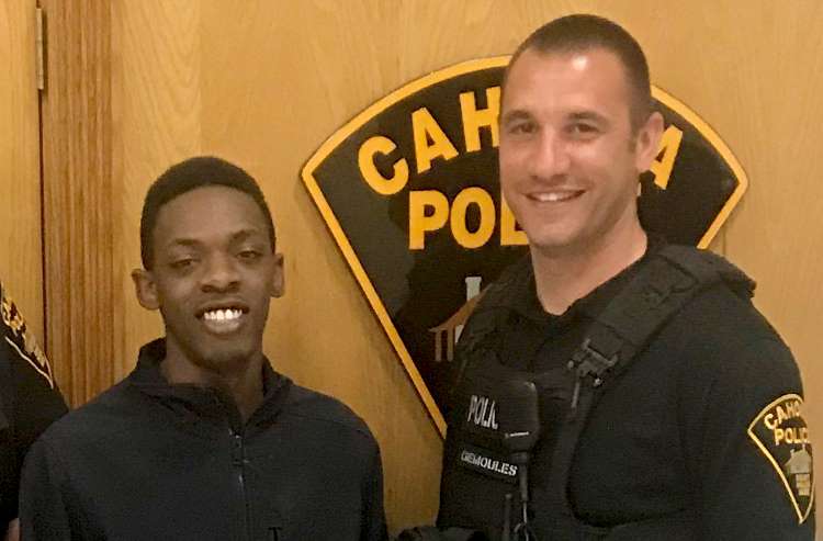 Ka' Shawn Baldwin and Officer Roger Gemoules Ka' Shawn Baldwin and Officer Roger Gemoules