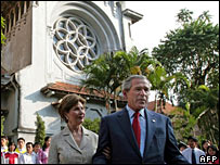 Bush's church visit rewards Vietnam  - When US President George W Bush attended a church in Vietnam on Sunday, his visit was a political statement as well as an act of faith. Just days before he arrived for the Asia-Pacific Economic Co-operation (Apec) summit, the US took Vietnam off a list of nations it believes severely violate religious freedom. In announcing the decision, the US state department said there had been 'significant improvements toward advancing religious freedom' in Vietnam in recent years.  Mr Bush's trip to Hanoi's Cua Bac church was designed to highlight those improvements, and make sure the trend continues.  'A whole society is a society that welcomes basic freedom - and there is no more basic freedom than the freedom to worship as you see fit,' he told reporters after the service.  'My hope is that people all across the world will be able to express religious freedom.'