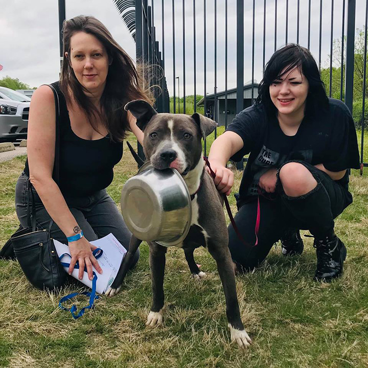 Oliver and his new owners who adopted him Oliver and his new owners who adopted him