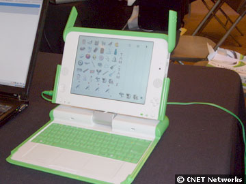 Lap Top - $100 - The B1 prototype is a lime-green-and-white laptop that's roughly the size of a schoolbook. It's made of dirt-resistant materials such as a rubber membrane keyboard.  Its features include a built-in video camera, VoIP, and a screen that swivels for e-book use.