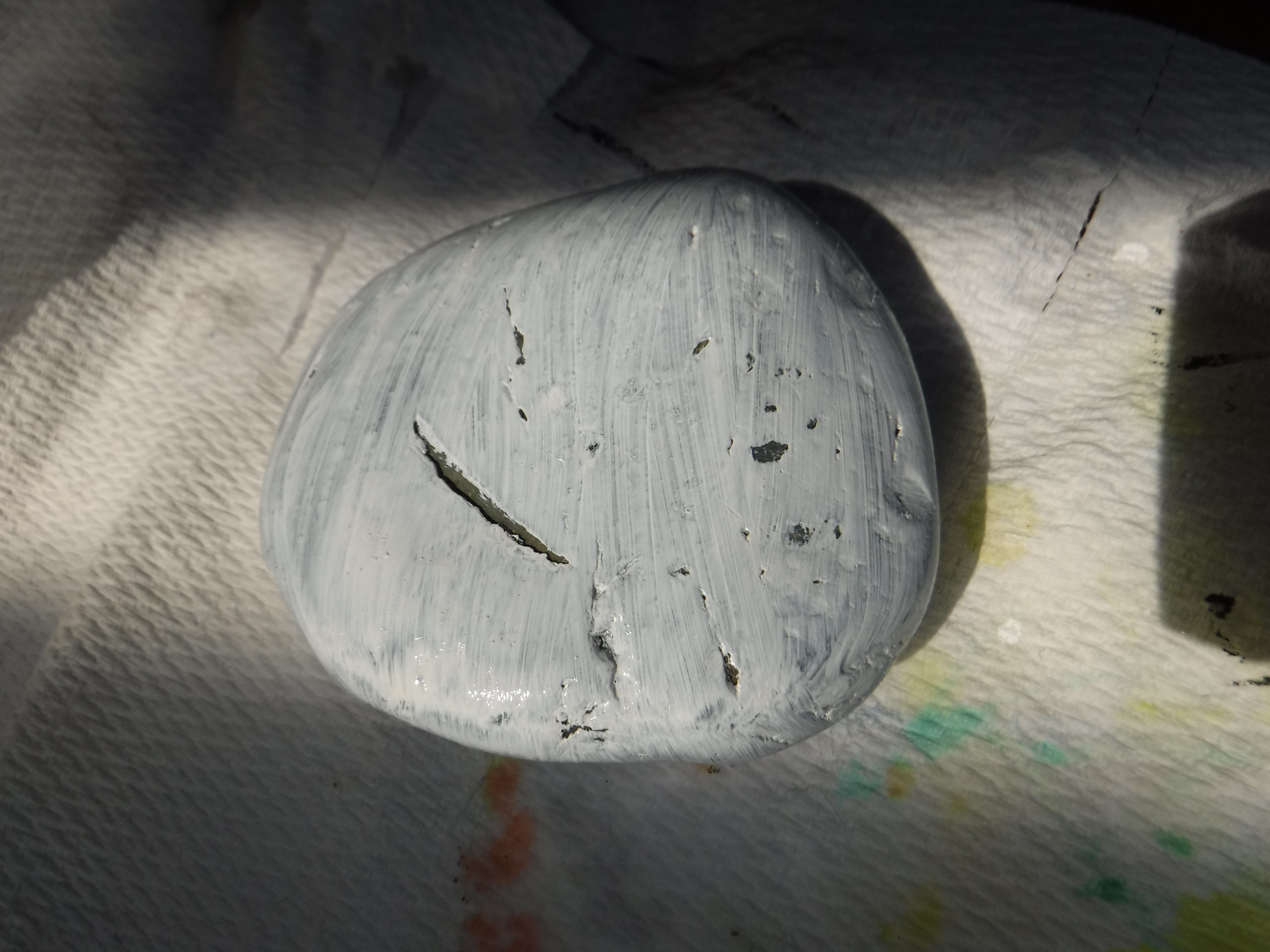 Photo I took of a rock that I put a base coat of paint on. Photo I took of a rock that I put a base coat of paint on.