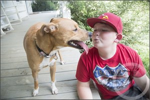 Riley with his owner Trey Snow having a friendly time Riley with his owner Trey Snow having a friendly time