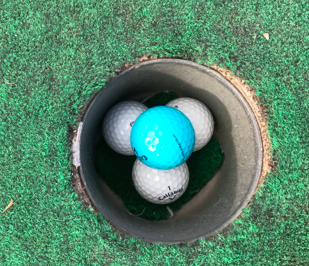 A golf ball pyramid. Photo taken by and the property of FourWalls. A golf ball pyramid. Photo taken by and the property of FourWalls.