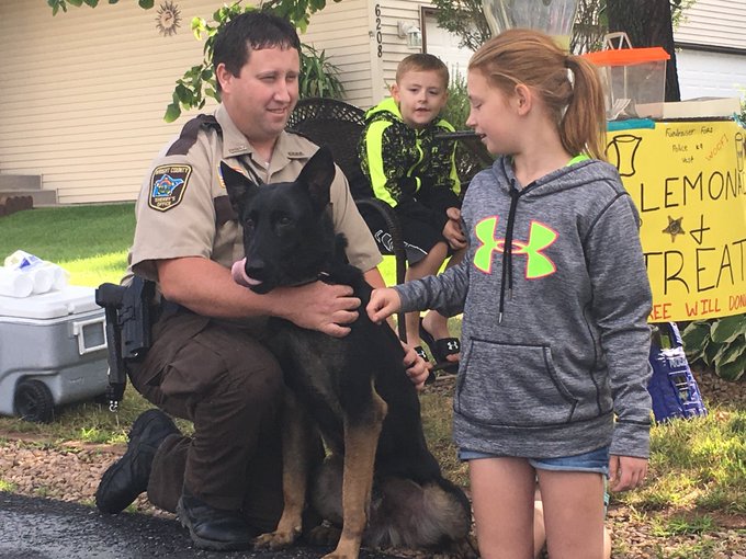 A Wright County Sheriff deputy and Josie Larson in Monticello