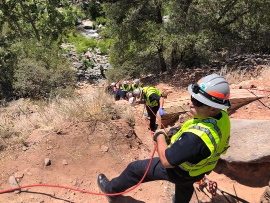 Arizona firefighters rescue a young girl who fell down 75 feet down a ...