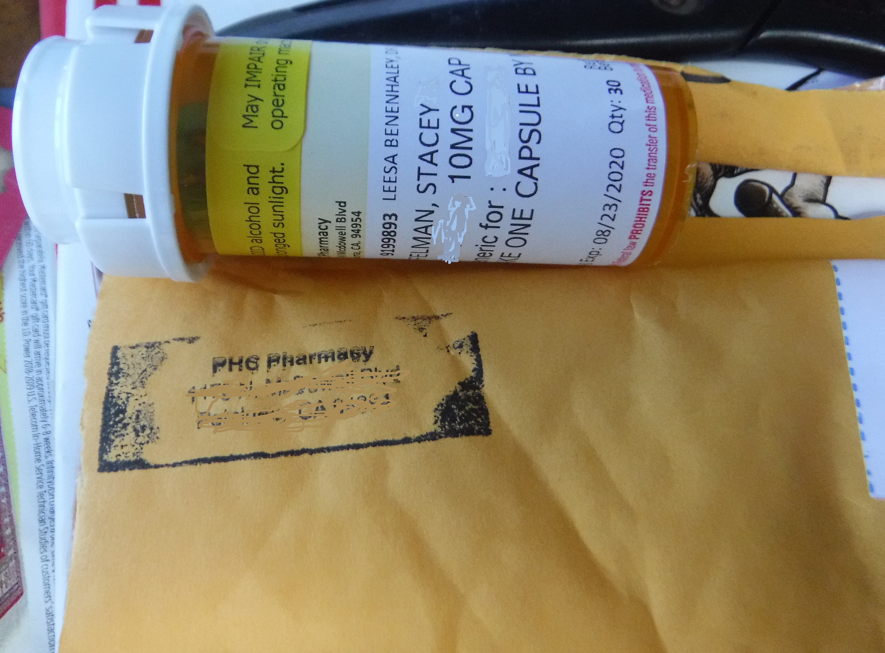 Photo I took of the pills I got today and the envelope they came in Photo I took of the pills I got today and the envelope they came in