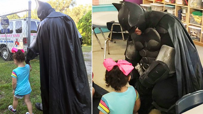 Batman fan showing his kind and gentle side to a 3 year old girl Batman fan showing his kind and gentle side to a 3 year old girl