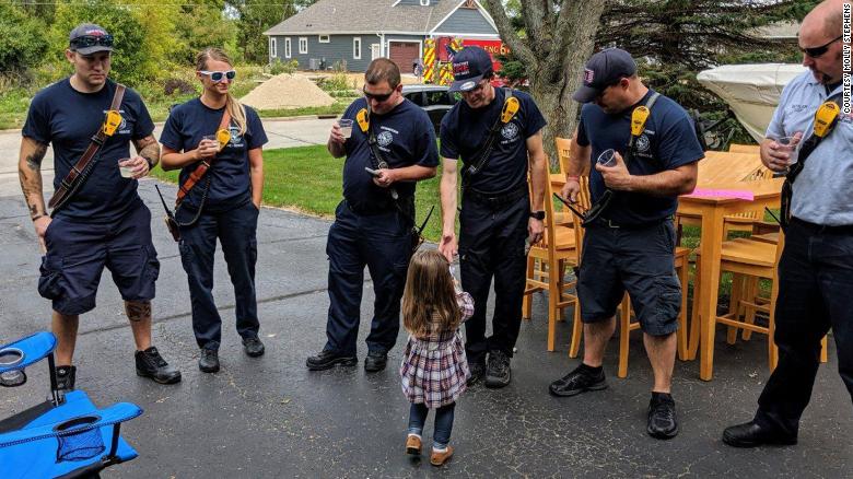 Germantown firefighters enjoying a nice lemonade from Lainie Stephens 