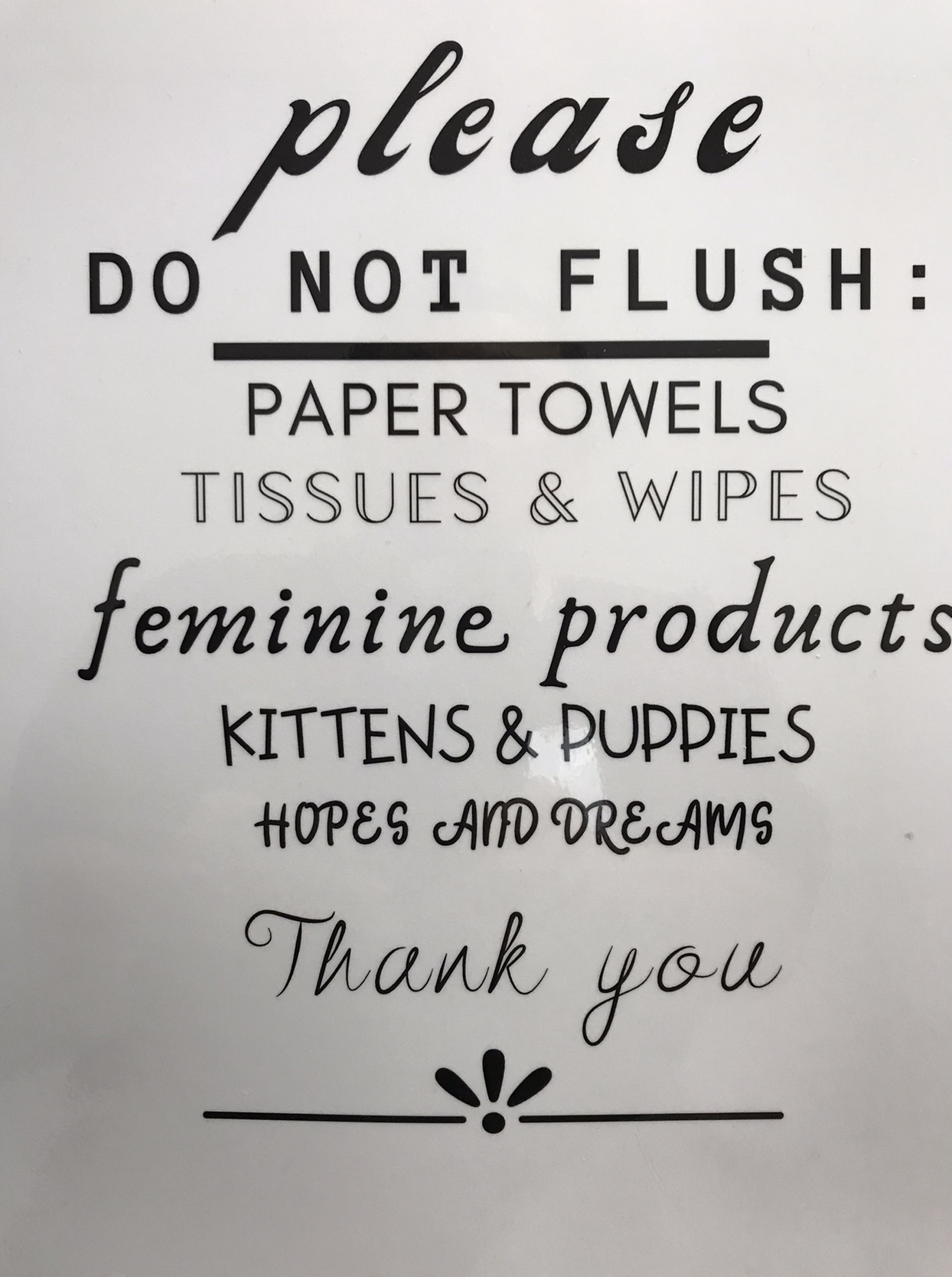 Funny sign In the gym restroom.  Photo taken by and the property of FourWalls.