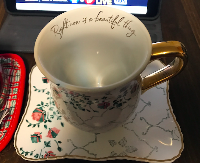 The beautiful tea cup and saucer I received as a farewell gift from work. Photo taken by and the property of FourWalls. The beautiful tea cup and saucer I received as a farewell gift from work. Photo taken by and the property of FourWalls.
