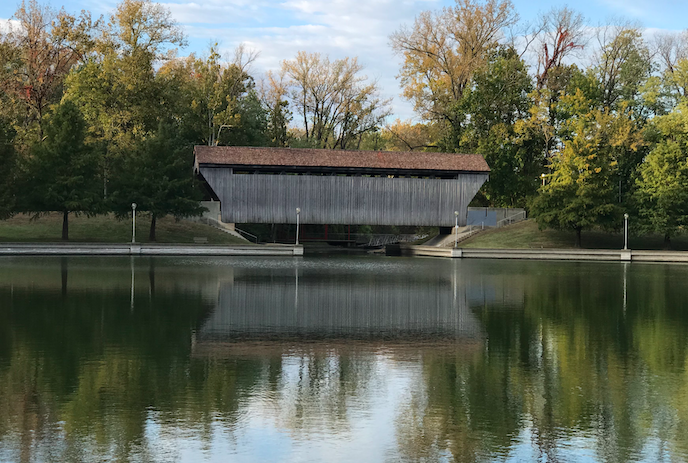 A chamber-of-commerce type shot of the Mill Race Covered Bridge in Mill Race Park, Columbus Indiana.  Photo taken by and the property of FourWalls.