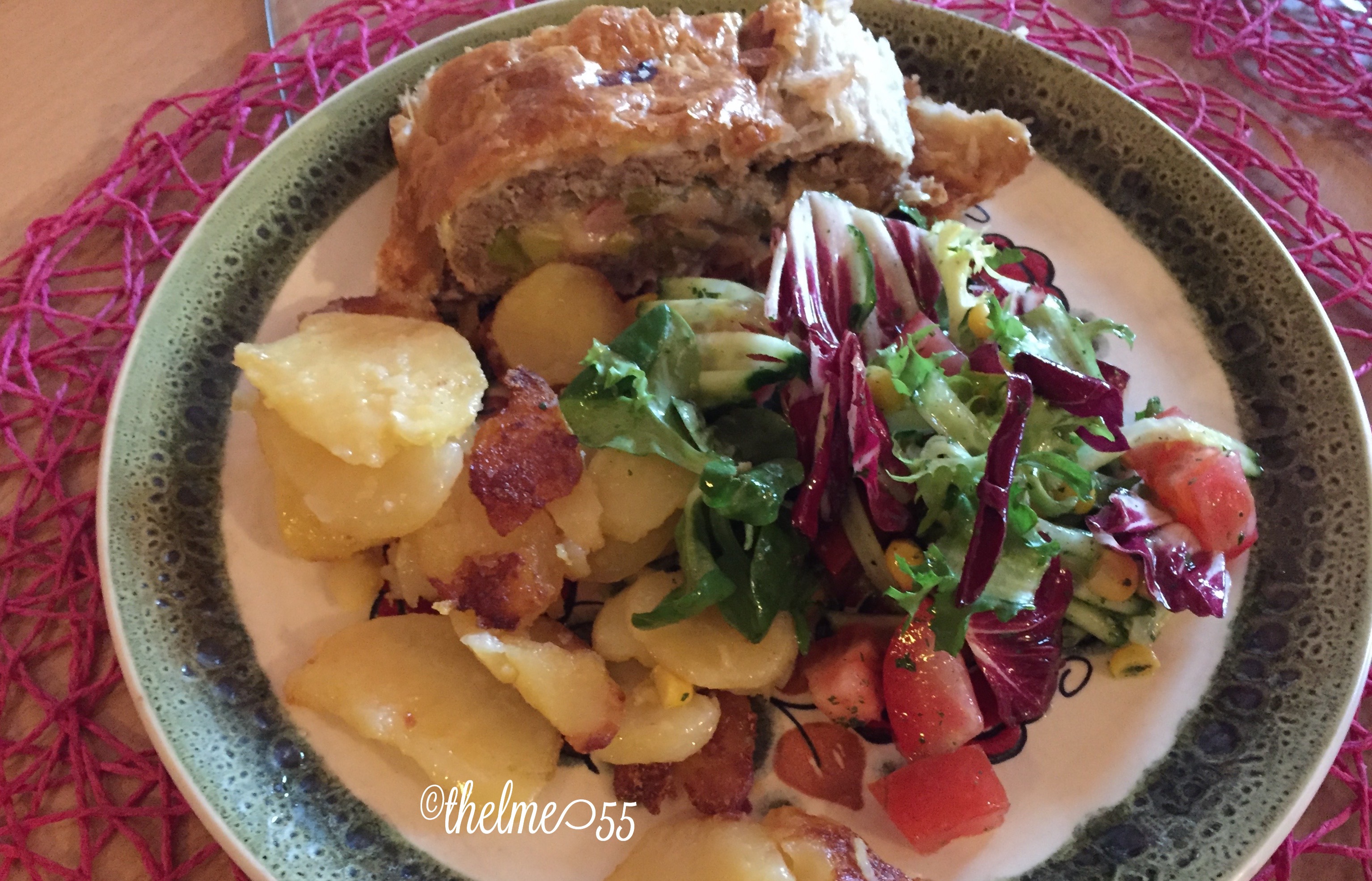 Filo wrapped meatloaf, fried potatoes and salad