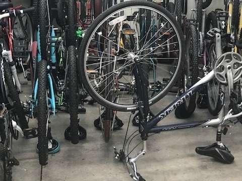 Bicycles that are inside a garage in a police station in Illinois