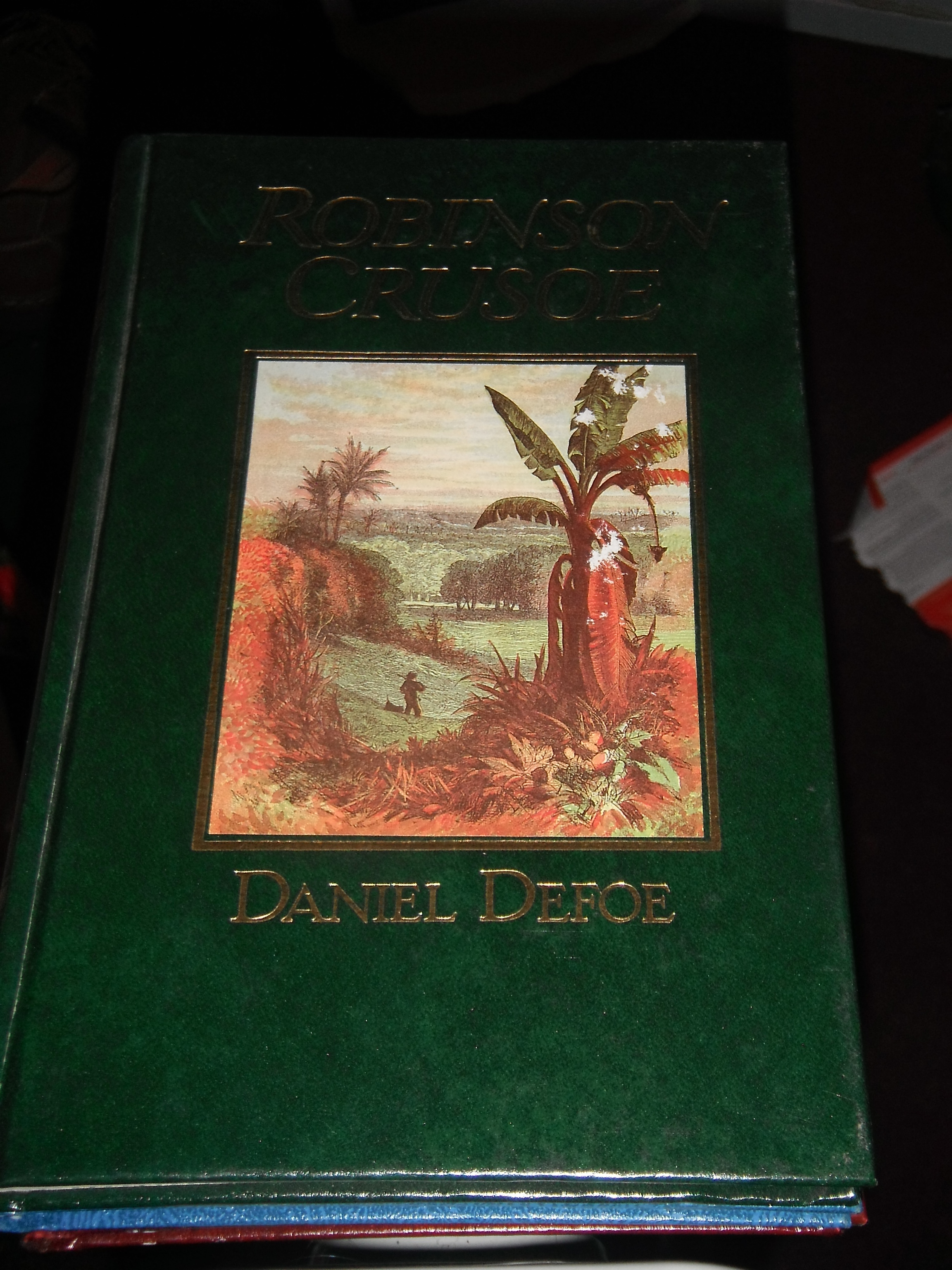 Photo taken by me - Book cover to Daniel Defoe's Robinson Crusoe Photo taken by me - Book cover to Daniel Defoe's Robinson Crusoe