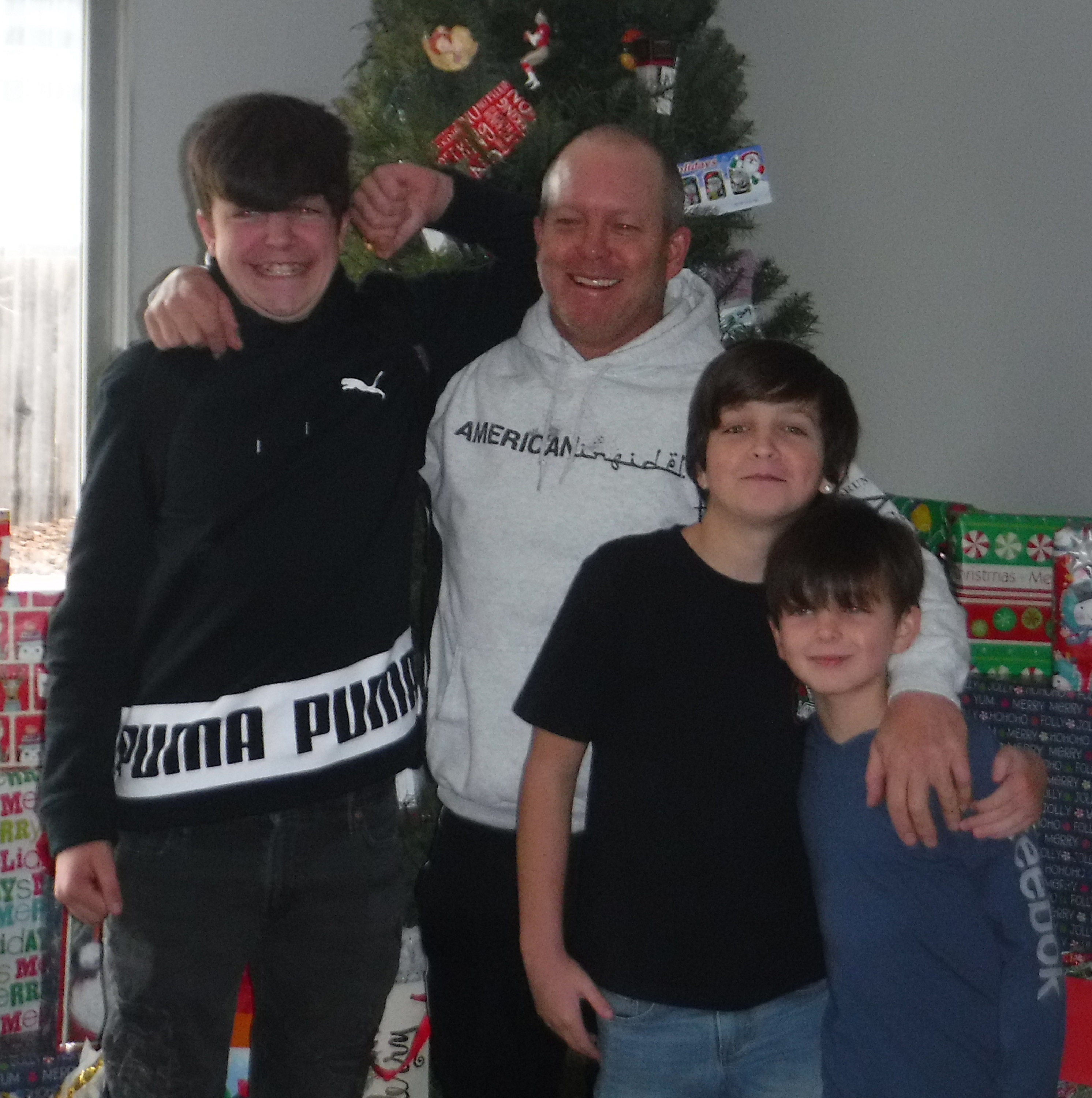 My brother and my three mega-handsome nephews 12-25-19