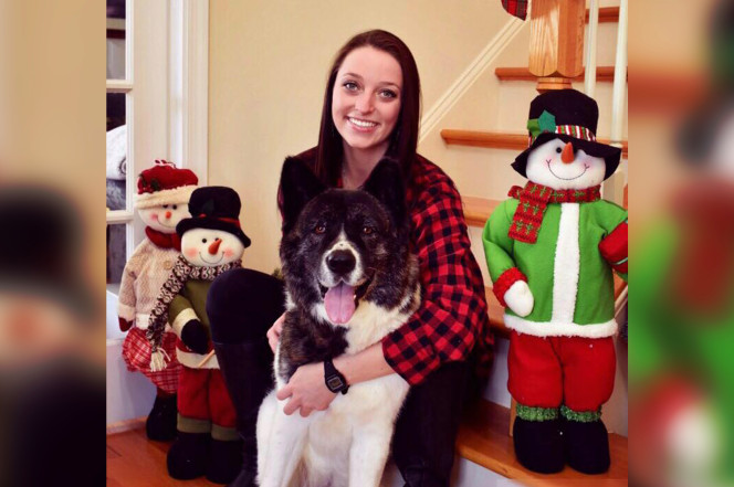 Laura Seymour and her pet dog Akita
