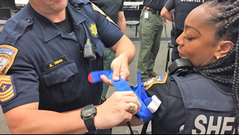A Harris County deputy being trained to use a turniquet