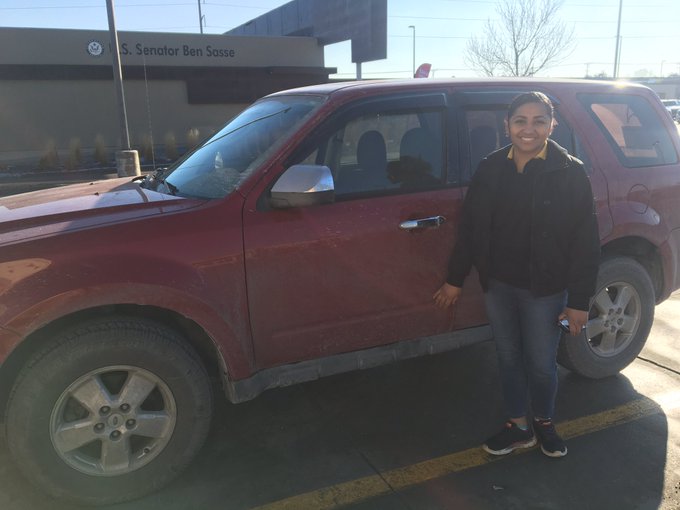 April Mungia and her new auto that was given to her by her boss. April Mungia and her new auto that was given to her by her boss.
