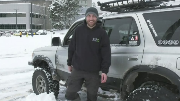 A Snow Angel driver with his Toyota auto in Canada