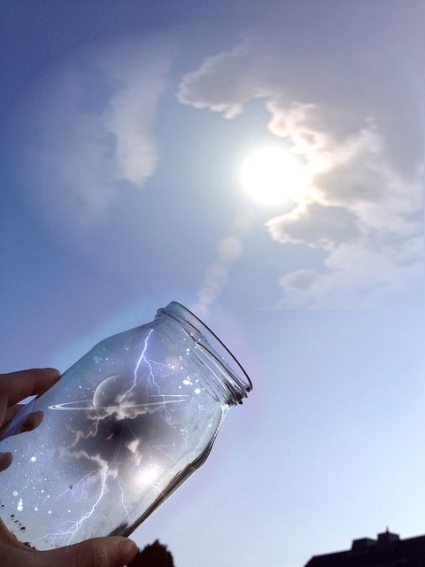 https://pixabay.com/photos/clouds-sky-universe-glass-hand-384955/
