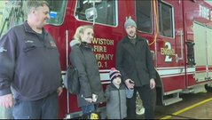 Lewiston Fire Company employees meet Carson and Stephanie Sansalone 