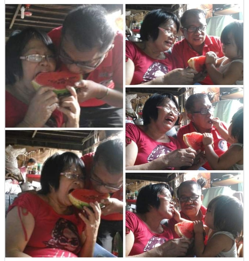 My wife and I taking a bite of watermelon My wife and I taking a bite of watermelon