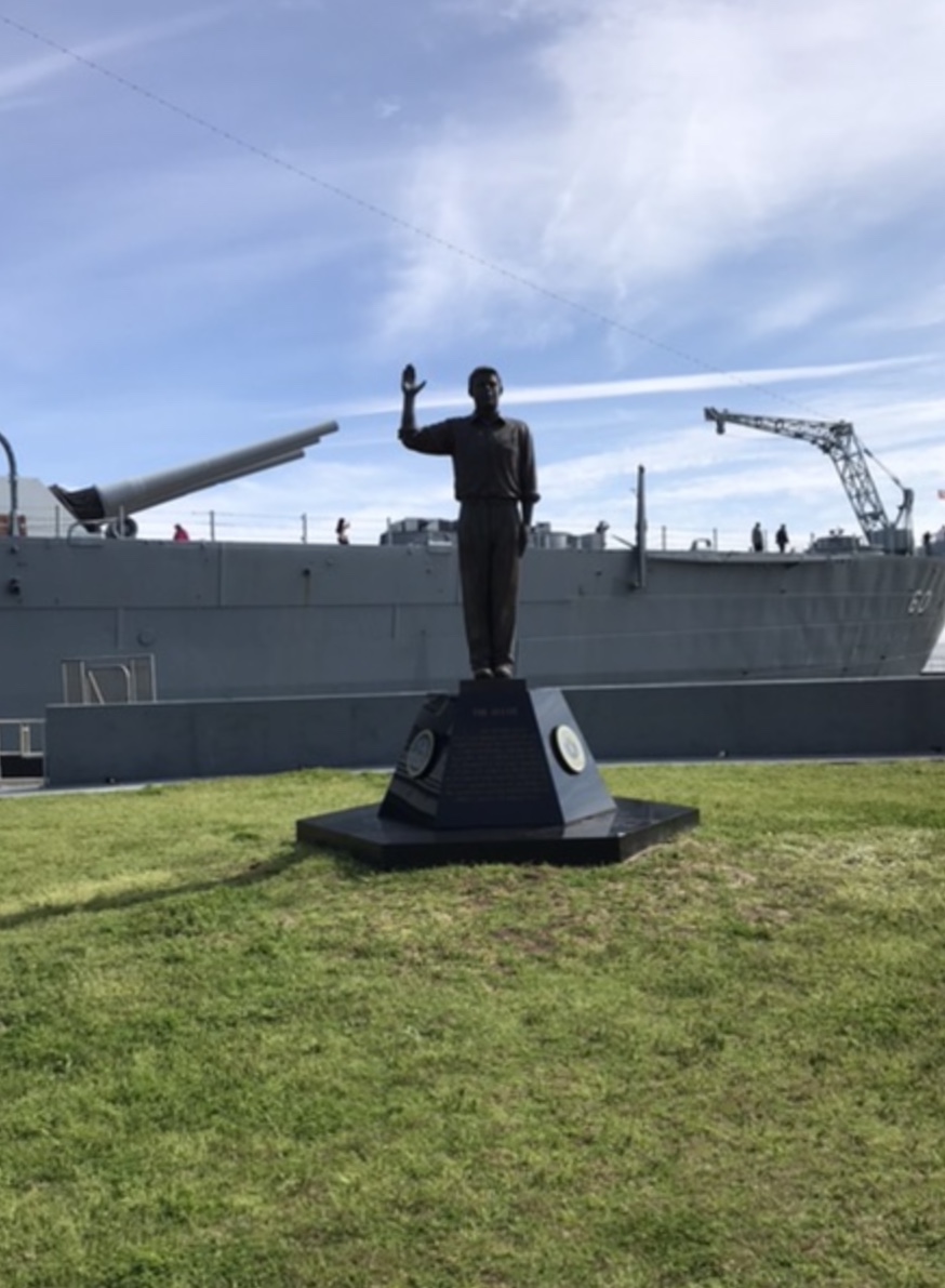 A sculpture called “The Oath,” with the enlistment oath on the base, with the USS Alabama behind it. The Drum is to the Alabama’s right. Photo taken by and the property of FourWalls. A sculpture called “The Oath,” with the enlistment oath on the base, with the USS Alabama behind it. The Drum is to the Alabama’s right. Photo taken by and the property of FourWalls.