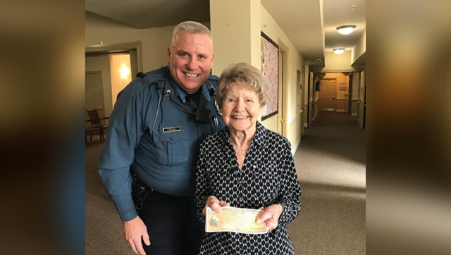 A Kansas City police officer and Jimmie Herbst A Kansas City police officer and Jimmie Herbst