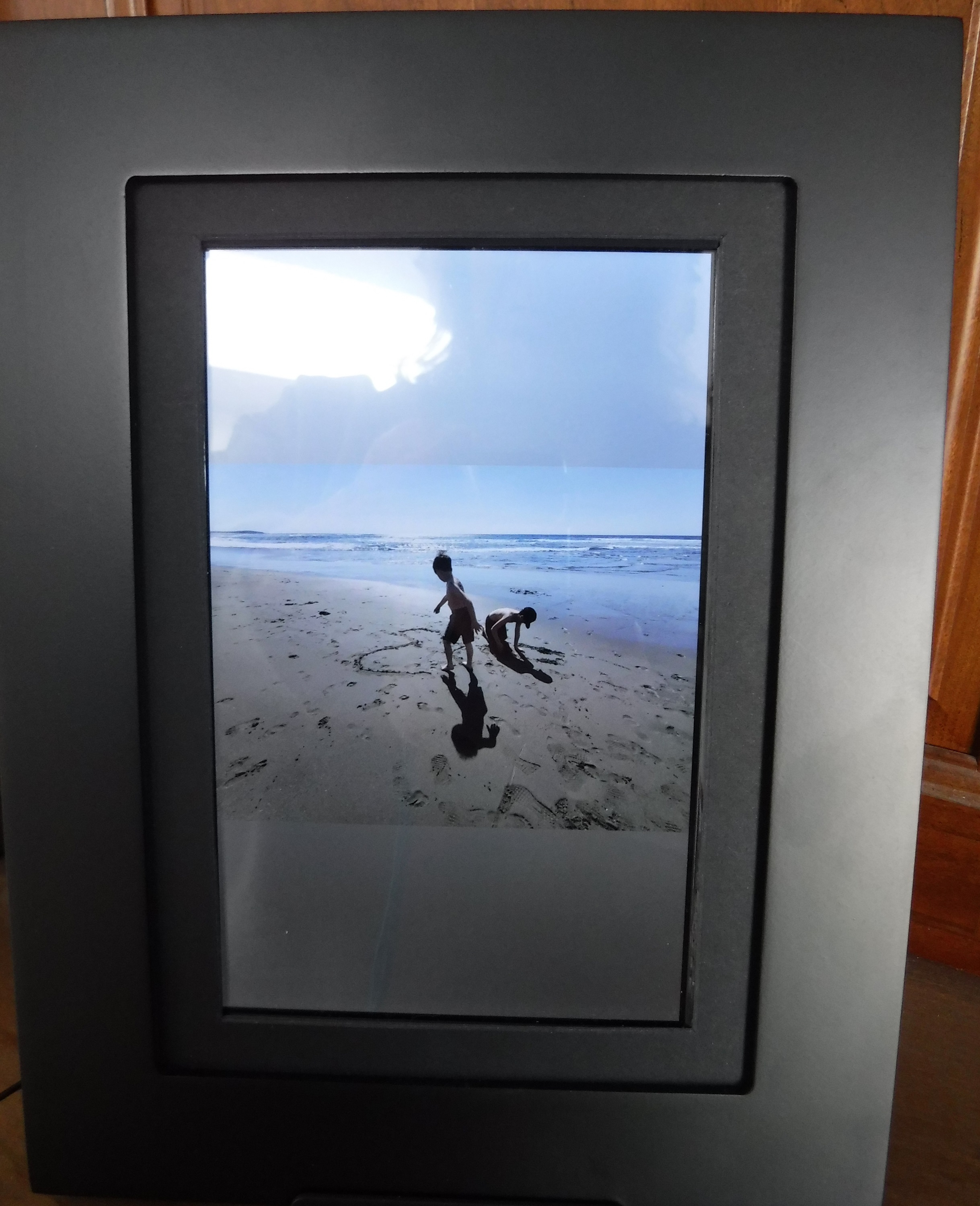 Photo frame brother's girlfriend gave me with photo of two of my nephews at the beach Photo frame brother's girlfriend gave me with photo of two of my nephews at the beach