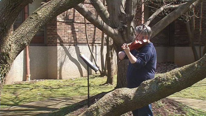 Violinist Matthew Lane plays music outside of a nursing home in KY Violinist Matthew Lane plays music outside of a nursing home in KY