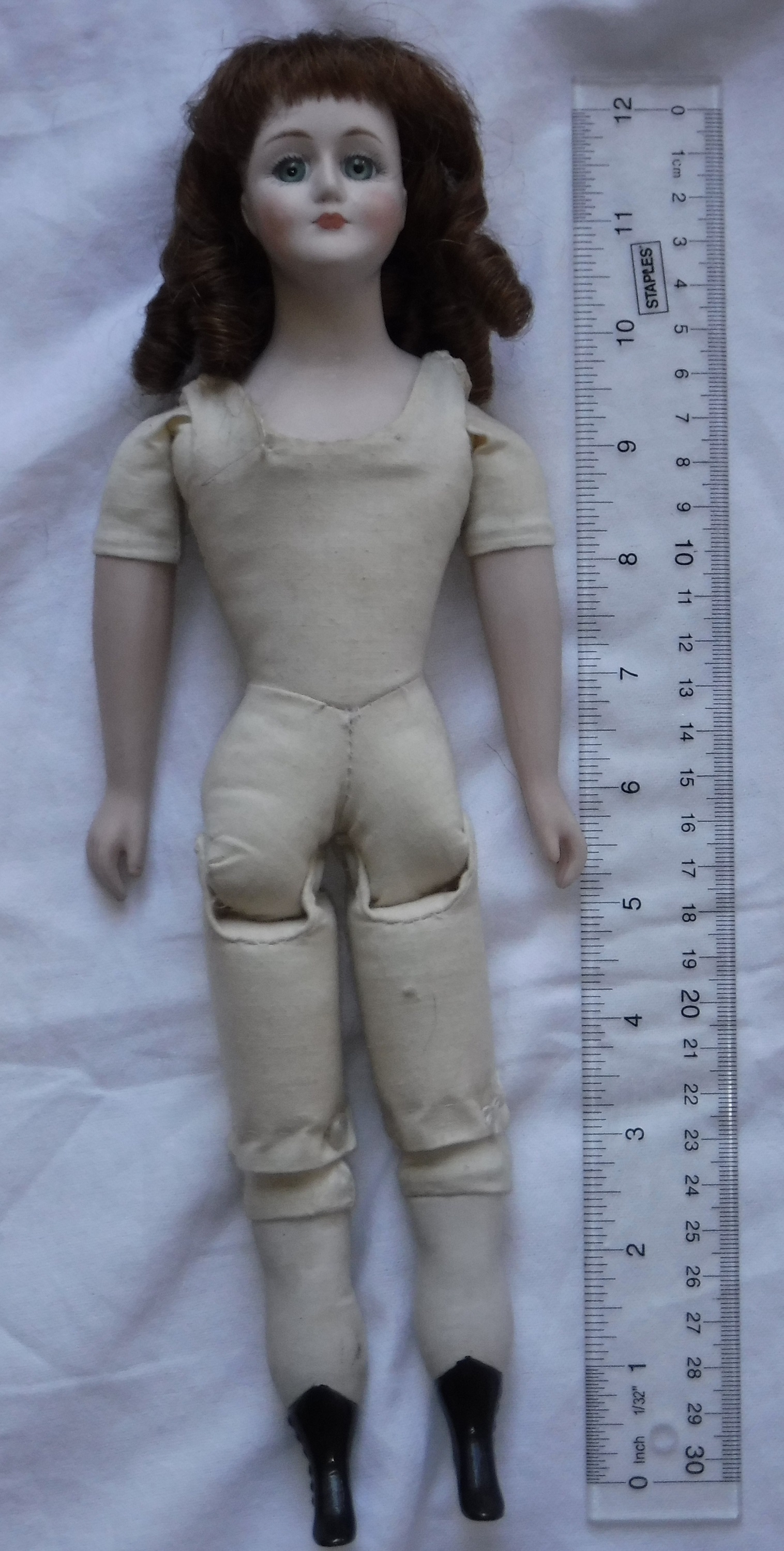 One of the photos I took of a doll I got out of the guest room.