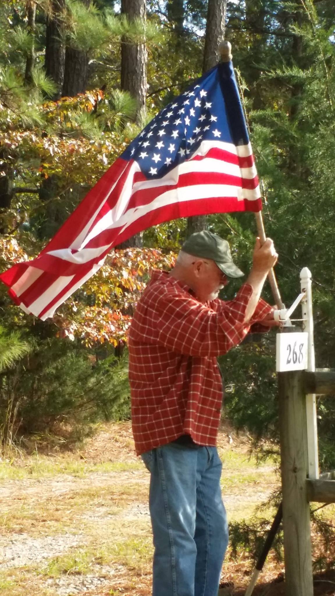 Skip Bates fixing his flag